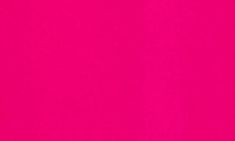 a bright pink background with white dots