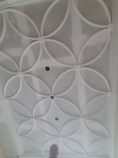 the ceiling is decorated with circles and dots