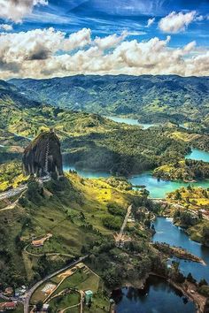 an aerial view of some mountains and lakes