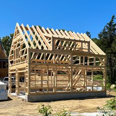 a house being built with wooden framing