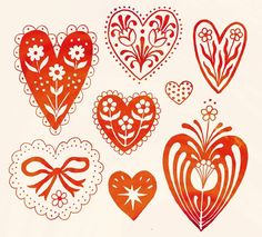 six heart shaped paper cut outs on a white background