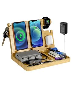 an iphone charging station with two phones in it