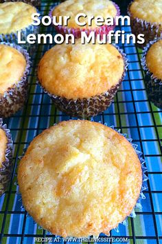 lemon muffins on a cooling rack with the words sour cream lemon muffins