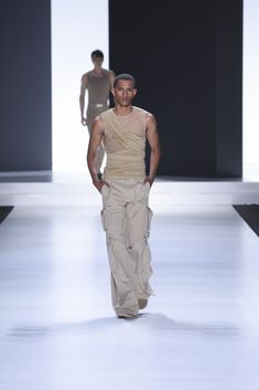 A sculptural tulle silk stretch t-shirt with jersey draping, paired with washed fabric cargo trousers in a 40-bottom style. A #DGRe-Edition from 2003. Draping Menswear, Jersey Draping, Silk Tulle, Draped Top, Design Clothes, Male Fashion