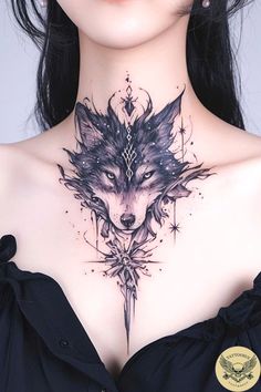 a woman with a tattoo on her chest has an image of a wolf's head