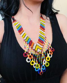 A vibrant and colorful necklace to enhance your style.🏵 Unique Multicolor Beaded Necklaces For Beach, Colorful Beaded Chain Beads For Festival, Colorful Beaded Chain For Festival, Multicolor Large Beads Necklace For Summer, Summer Multicolor Necklace With Large Beads, Multicolor Beaded Chain For Festival, Multicolor Long Beaded Necklace For Summer, Vibrant Multicolor Handmade Necklaces, Unique Multicolor Summer Necklaces