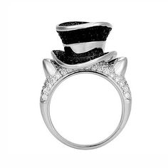 Introducing the Tophat Cat Statement Ring, a harmonious blend of whimsical charm and luxurious elegance, exclusively designed by the Ginger Lyne Collection. This ring captures the essence of feline allure, boasting an intricate design that features adorable cat ears paired with a classy tophat. Each element is meticulously crafted to shine brilliantly, thanks to its white gold plating over durable copper. But the true magic lies in its stone setting. The ring is adorned with AAA-grade sparkling Engagement Rings Twisted, Cat Ring, Cute Kitty, Ring Black, Rings For Girls, One Ring, Rings For Her, Gold Set, White Ring