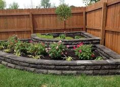 a garden in the middle of a fenced area