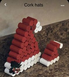 a christmas decoration made out of legos sitting on a counter next to a wall