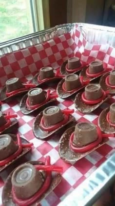 there are many hats on top of each other in the tin foil tray, ready to be eaten