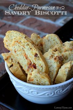 cheddar parmesan and savory biscotti in a white bowl