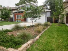 the front yard is clean and ready to be used as a landscaping area for this home