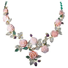 The Following Item we are offering is a Rare Important Radiant White Gold Large Fancy Coral, Emerald, Sapphire Diamond Necklace. Necklace is comprised of a Gorgeous Fancy Carved Coral Carved Flowers adorned with Exquisite Rare Glittering, Sapphires, Emeralds, and Diamonds forming leaves. T.C.W OVER 150CTS!!! Comes with New with Tags from a Private Manufacturer that sells to Important 5 Star Hotel and Fine Jewelry Stores. Original Retail Price: $65,000.00!!! A Rare Gorgeous Masterpiece!!! Sapphire Diamond Necklace, Coral Roses, Sapphire And Diamond Earrings, Big Diamond, Coral And Gold, Blue Sapphire Diamond, Fringe Necklace, Modern Necklaces, Gold Flower