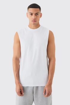 Basic Drop Armhole Tank | boohooMAN USA Sleeveless Sports Top For Summer, Sleeveless Muscle Tee For Summer Sports, Cotton Top For Gym In Summer, Cotton Gym Top For Summer, Summer Muscle Tee For Gym, Summer Cotton Gym Top, Summer Gym Cotton Top, Cotton Sleeveless Muscle Tee For Summer, White Sleeveless Muscle Tee For Summer