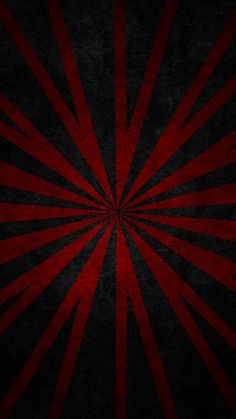 an abstract red and black background with sunbursts