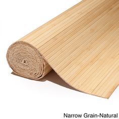 a roll of bamboo is laying on the floor