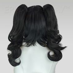 Rhea Black Pigtail Wig Set This Black pigtail wig set uses our 14" Chronos style as a base for two of our 20" clip-on ponytails to create a a fun and versatile pigtail style. The base wig is a short bob cut style that frames the face and can be worn independently, with only one clip, or with both clips. Each 20" ponytail comes with a large alligator claw clips at its base, making it easy to attach onto any portion of the base wig where there is wefting. Clip the ponytails of this Black pigtail w