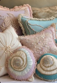 decorative pillows with beading and pearls on them