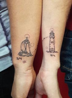 two people holding hands with tattoos on their arms and one has a lighthouse in the background