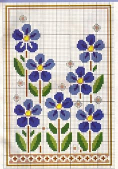 a cross stitch pattern with blue flowers on it