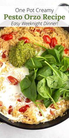 one pot creamy pesto orzo recipe in a skillet with spinach and tomatoes