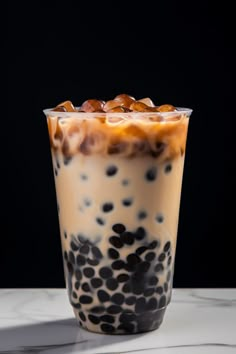 an iced drink with ice and caramel on top