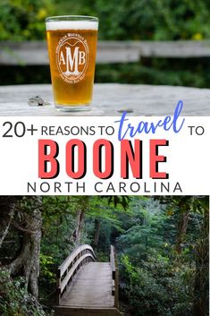 a glass of beer sitting on top of a wooden bridge with the words 20 reasons to travel