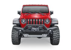 the front end of a red jeep