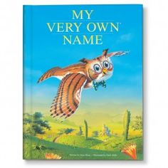 the book cover for my very own name with an owl flying through the sky and trees