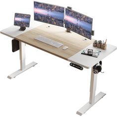 three computer monitors sitting on top of a wooden desk next to a keyboard and mouse