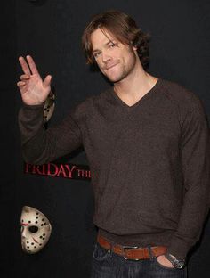 a man making the vulcan sign with his hand