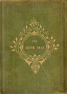 an old book with gold lettering on the cover and ornate border around the title page