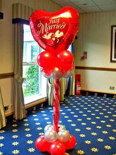 balloons in the shape of a heart are on display