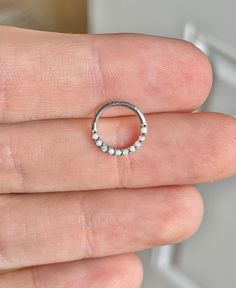 "6mm 8mm 10mm 16G Solid Gold Daith or Septum Ring | Dainty 14k Gold Septum Piercing Opal Nose Ring Clicker Minimalist Delicate Septum Ring This septum piercing is made of 14K gold, and has faux opals. Piercing \"clicks\" into place. Super dainty minimalist look - drop jaws with this body jewelry! **Please upgrade to priority shipping at checkout for an additional $3 if you would like to insure your package! I am not responsible for lost, delayed or stolen packages.** Details & Size: ♥ 14k Solid Everyday Minimalist Round Opal Ring, Minimalist Round Septum Ring For Everyday, Minimalist Hypoallergenic White Gold Septum Ring, Minimalist Everyday Round Septum Ring, Minimalist White Gold Opal Ring, Dainty Septum Ring For Anniversary, Hypoallergenic Round Opal Jewelry, Internally Threaded White Gold Ring Gift, Hypoallergenic Round Septum Ring For Anniversary