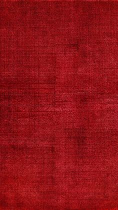 an old red rug is shown in this image