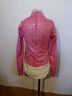 "This beautiful shirt is simple in design but is high in sparkle and shine! Our classic sweetheart neckline is trimmed in metallic silver. Comes with attached brief to stay tucked in. Zip back. Merchandise is shipped within 1 to 3 weeks. If needed by a certain date, message us right away, call us at 435.279.6246, or e-mail us at gloria [!at] rodeoqueenshirts.com to check availability. We try to keep 1 of every shirt in stock so if you need it sooner please contact us as we will try to help! US o Shiny Fitted Top For Party Season, Fitted Shiny Tops For Party Season, Fitted Shiny Tops For Night Out, Pink Fitted Tops For Party Season, Fitted Shiny Top For Spring, Glamorous Shiny Stretch Tops, Fitted Tops With Shine For Spring, Fitted Metallic Top For Party Season, Stretch Disco Tops With Long Sleeves