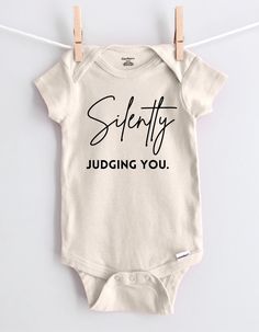 Silently Judging You Funny Baby Onesie | Gerber Infant Bodysuit | Cute & Hilarious Baby Shirt | Perfect Baby Shower Gift | Adorable Home Coming Baby Bodysuit Outfit Item Details: -Gerber Brand Premium ONESIES® -Short Sleeves -100% Cotton Item Care: Machine wash on cold & hang to dry for best results. To preserve the print for longer, wash inside out Onesies® Brand are printed on Gerber brand. Multi colors runs true to size Onesies® Brand SIZE CHART 0-3 months : 21-24 in. / 8-12 Ibs. 3-6 months : 24-26 in. / 12-16 Ibs. 6-9 months : 26-28 in. / 16-20 Ibs. 12 months : 28-30 in. / 20-24 Ibs. 18 months : 30-32 in. / 24-28 Ibs. SHIPPING POLICY Thank you for shopping with us! Your order is expected to be shipped on the next business day. However, please note that delivery times may vary due to fa Diy Baby Onesies, Diy Onesies, Baby Onesie Ideas, Funny Baby Shirts, Funny Baby Onesie, Onesie Ideas, Adorable Home, Bodysuit Outfit