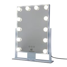 a mirror with lights on top of it