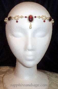 Cassandra Circlet Headpiece www.sapphireandsage.com  Simplicity with flirty flair! The acrylic cabochon stones in this circlet are 14x10mm smooth domed cabochons. The 6mm fire polished bicone accent beads featured are imported glass, as are the 12x7mm and 15x8mm teardrop pearl pendant beads. Medieval Circlet, Jewel Headband, Jeweled Hair, Tiara Hair, Silver Head Piece, Gold Headpiece, Jeweled Headband, Gold Topaz, Medieval Jewelry