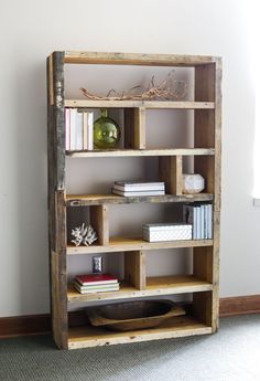 an old book shelf with books on it