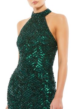 The most festive of frocks is rendered in a verdant hue, gridded with sequins and styled to show off your shoulders with alluring aplomb. 46" length Halter neck Sleeveless, with cutaway shoulders Lined 100% polyester Spot clean Imported After Prom, Halter Cocktail Dress, Plastic Dress, Sequin Halter, Cocktail Dress Prom, Beaded Cocktail Dress, Semi Formal Dress, Western Chic, Lattice Pattern