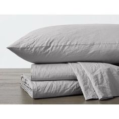 three pillows stacked on top of each other