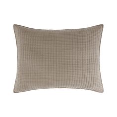 a beige pillow with a grid pattern on the front and back, sitting on a white background