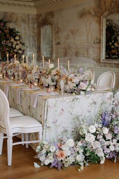 Bridgerton inspired wedding table setting with floral table cloth, pastel colour flowers, gold leaf cutlery, regal white chairs, pale taper candles in gold candlestick holders. Kamila Nowak Photography. Bridgerton Inspired Wedding, Regency Decor, Dream Wedding Decorations, Wedding Tablescape, Ruffle Wedding Dress, Beautiful Table Settings