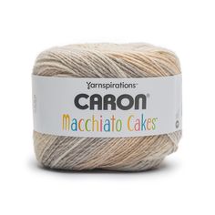 yarn that is white and brown with the words carbon machchato cakes on it