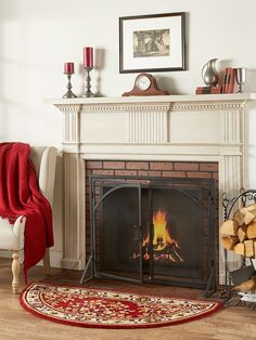 a living room with a fire place and rug