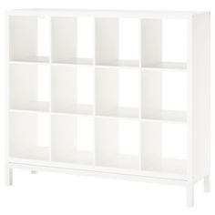 a white bookcase with many cubes on the front and bottom shelves in different sizes