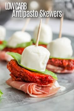 small appetizers with meat and cheese on them