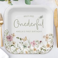 a white plate with flowers on it and the words, wild and onederful