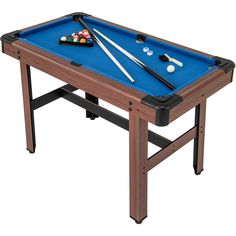 a pool table with two cues and balls on it, ready to be used for billiards